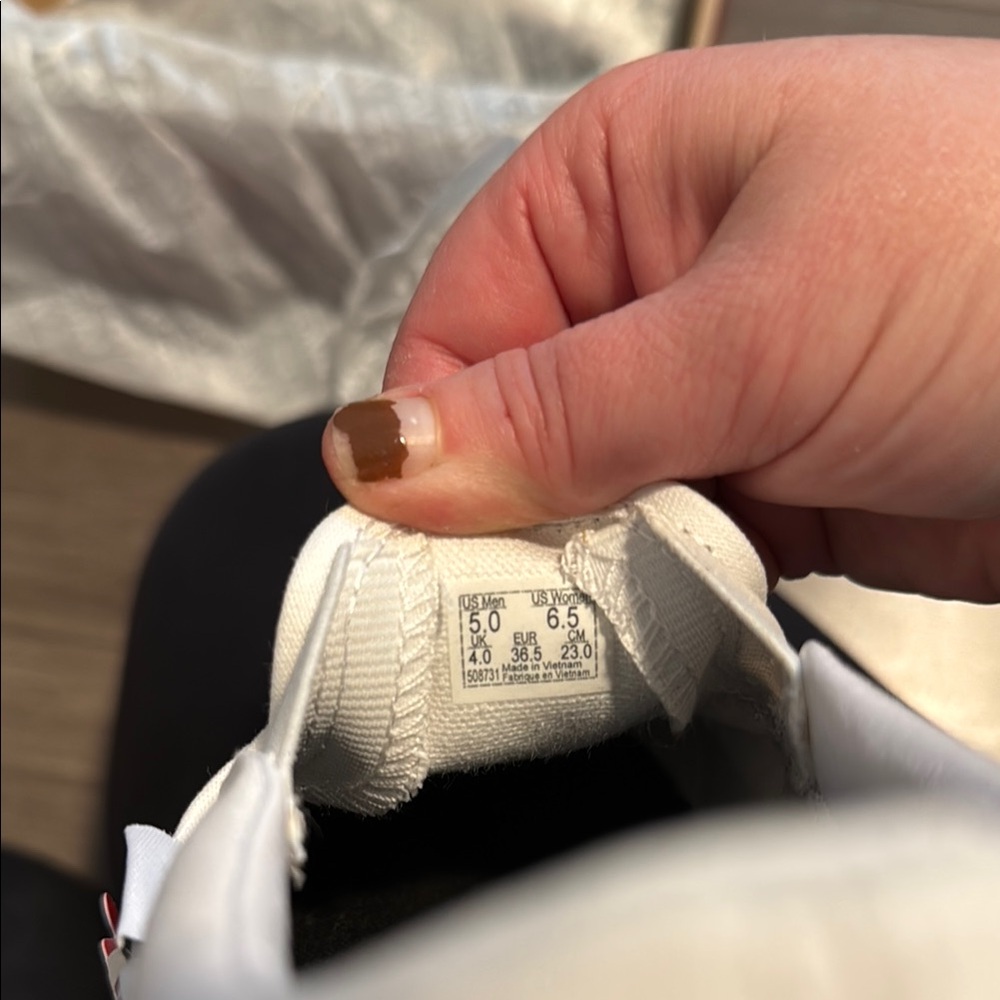 Vans Black and White Slip-On Sneakers - Picture 9 of 9